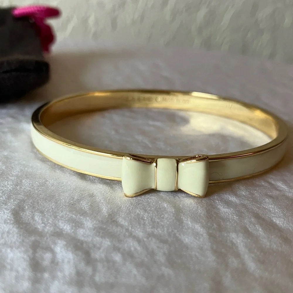 kate spade: Cream “Take a Bow” Bracelet- Gold Tone - Picture 4 of 14
